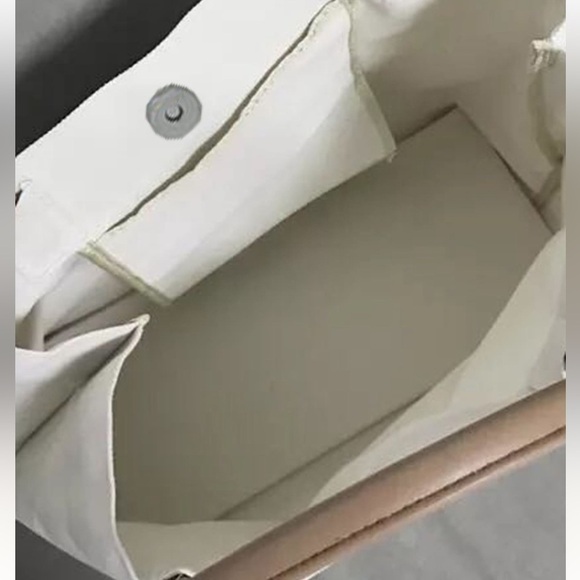 Elegant Cream Tote Bag with Tan Handles - Picture 6 of 7